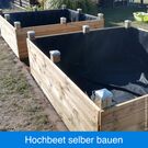 Unsere Hochbeete fertig aufgebaut und ausgekleidet.