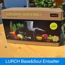 Die Verpackung (vorn) des Lurch Slow Juicer Base&Soul